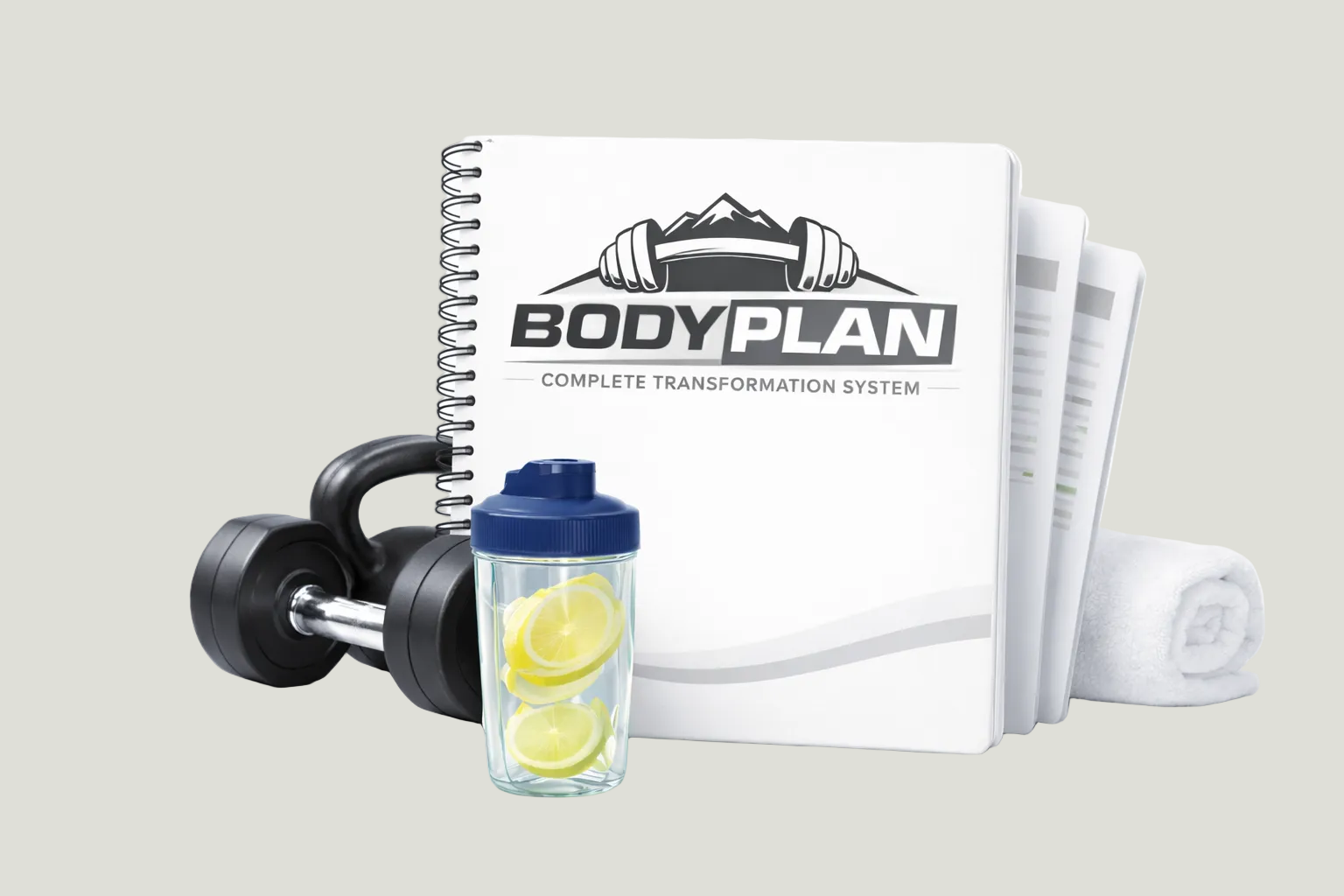 Fitness accessories including a dumbbell, water bottle with lemons, and a 'BODY PLAN' transformation system book on a white background.